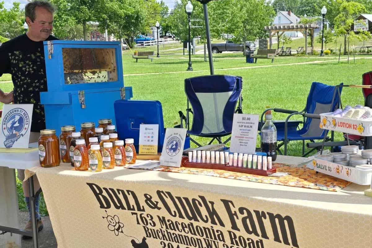 fellowship Fund buzz and cluck farm booth